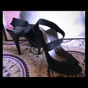 Brand new, black suede, open toe heels.